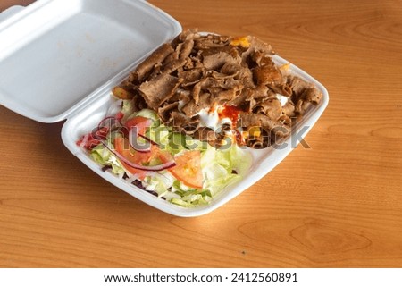 Similar – Image, Stock Photo Styrofoam box with food from snack bar on shimmering satin bed sheet