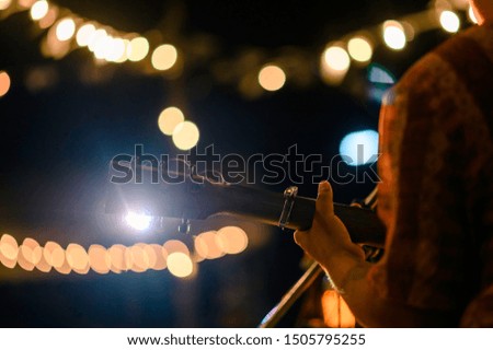 Similar – Image, Stock Photo Guitarist playing outdoors