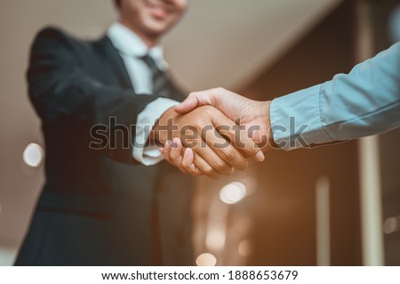 Businessman shake hands and get to know each other before they start talking about business.Bussiness,working, success concept 