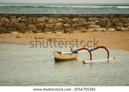 Similar – Image, Stock Photo small boats parked on the sand of a beach during sunset