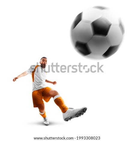 Power soccer kick. A soccer player kicks the ball. Professional soccer player in action. Isolated. Sport