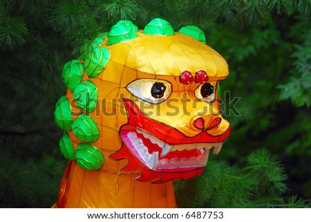 Portrait of an Illuminated Chinese Dragon with a green background