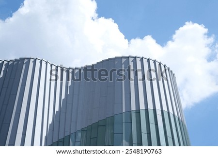 Similar – Image, Stock Photo Glass wavy facade of an office building