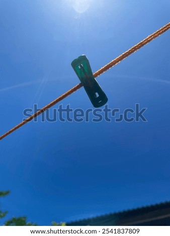 Image, Stock Photo colored plastic clothespins illuminated