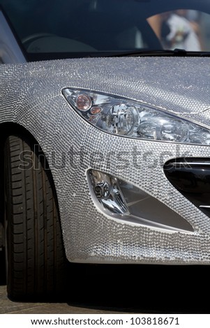 LONDON, UK - MAY 29:  Peugeot produce a car covered in hundreds of diamonds to celebrate the queens Jubilee on the MAY 29, 2012 in London, UK