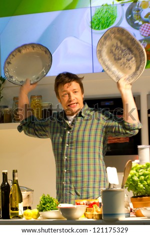 LONDON, UK - DEC 7: Jamie Oliver conducts a cooking demonstration at the Excel center in London, Friday, December 7, 2012 in London, UK