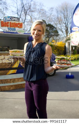 LONDON, UK - MAR. 29: Jo Whiley poses with sandwiches at the launch of a kingsmill road show in London on the Mar 29, 2012 in London, UK