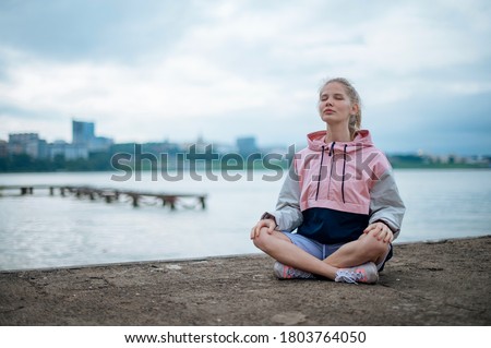 Similar – Image, Stock Photo Woman meditating near tropical bush