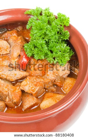 Meat with potato baked in a pot