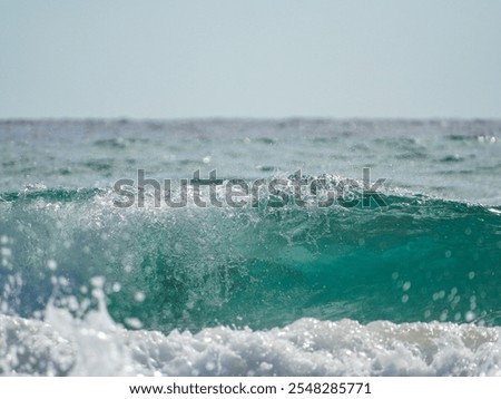 Similar – Image, Stock Photo Rippled ocean near green mountain with walkway under sky