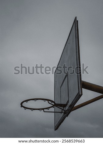 Similar – Foto Bild Basketballkorb reflektiert auf der Pfütze auf dem roten Boden