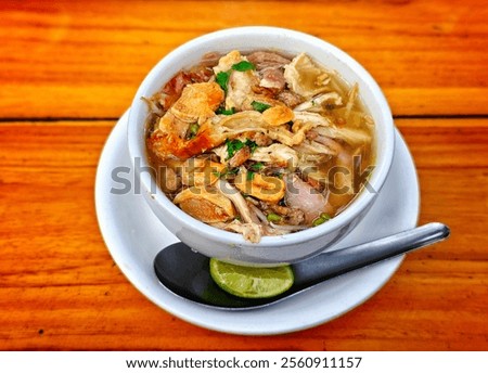 Similar – Image, Stock Photo Served chicken soup with carrot and zucchini