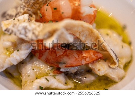 Similar – Foto Bild Seehechtfisch und Muscheln mit grüner Sauce