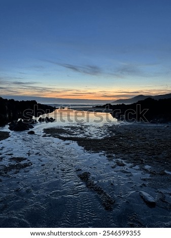 Similar – Image, Stock Photo Rippling sea with rocky coast in twilight