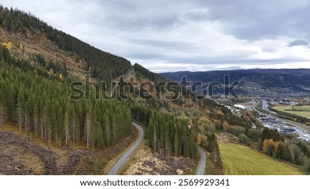 Similar – Image, Stock Photo Winding road on hilly terrain