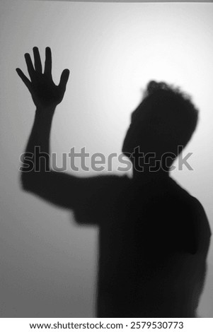 Similar – Image, Stock Photo Anonymous person touching glass of window