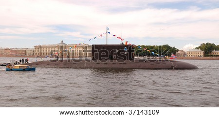 PETERSBURG-JULY 26: Naval parade by day of navy fleet of Russia. A submarine on the river Neva. Panorama. July 26, 2009 in Saint-Petersburg, Russia