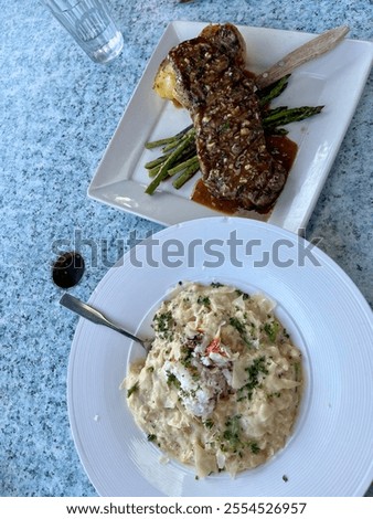 Similar – Foto Bild Speiseteller mit Trüffelkäse, Entenbrust, Briekäse, Pekannüssen, Granatapfelkernen, Trauben, Mandeln, Honig, Oliven und Crackern