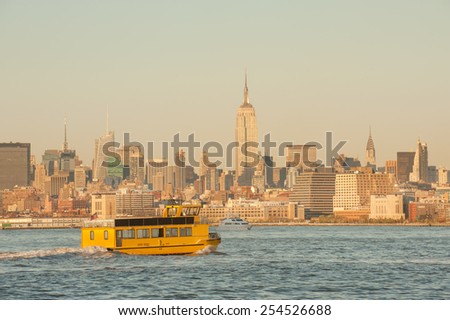 Yellow water taxi to Midtown Manhattan across Hudson river