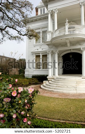 White mansion in traditional style in New Orleans\' Garden district
