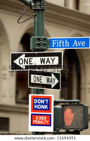 Fifth Avenue sign in pedestrian crossong, midtown Manhattan, NYC
