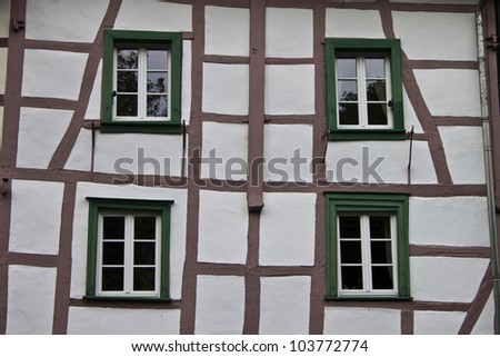 Detail of typical half timbered house in Monschau, Germany. The historic town center has many preserved half-timbered houses and narrow streets have remained nearly unchanged for 300 years