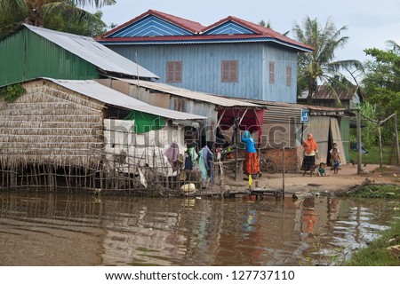 KAMPOT, CAMBODIA - JULY 21: View of a poor village on July 21, 2012 in Kampot, Cambodia In Cambodia, GDP per capita is only $2,361.