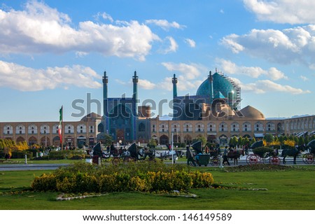 ISFAHAN, IRAN - MARCH 7: People at Imam square on March 7, 2013 in Isfahan, Iran. Square is 160 meters wide and 508 meters long.