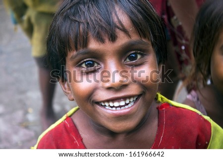 ALLAHABAD, INDIA - AUG 10: Unidentified happy boy on August 10, 2011 in Allahabad, India. Allahabad (population 1,2 mil.) is a major city of India and is one of the main holy cities of Hinduism.