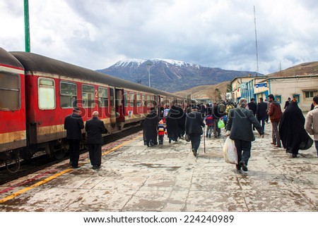 DORUD, IRAN - MARCH 6: Unidentified people on a train station in Dorud, Iran on March 6, 2013. Dorud is a city with population of 159,026 in Lorestan province.