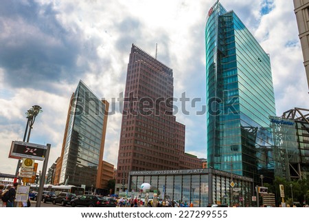 BERLIN, GERMANY - JUNE 8: Potsdamer Platz and railway station in Berlin, Germany on June 8, 2013. It\'s a one of the main public squares and traffic intersections in the center of Berlin.