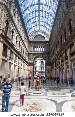 NAPLES, ITALY- JULY 1, 2014: Shopping gallery Galleria Umberto in Naples, Italy. Naples historic city center is the largest in Europe, and is listed by UNESCO as a World Heritage Site.