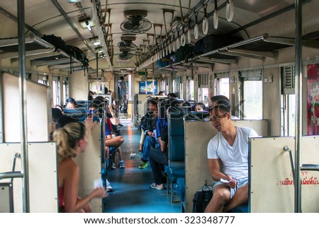 BANGKOK, THAILAND - AUGUST 14: Interior of a local train in Bangkok, Thailand on August 14, 2013. Trains in Thailand provide a cheap and fun way to see the real Thailand.