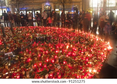 PRAGUE, CZECH REP. - DEC 21:People light candles on Wenceslas square in honor of deceased former president of Czechoslovakia and Czech Republic, Vaclav Havel on December 21, 2011 in Prague, Czech Rep.
