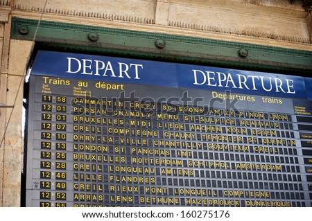 Train departure schedule at the Gare du Nord train station in Paris, France