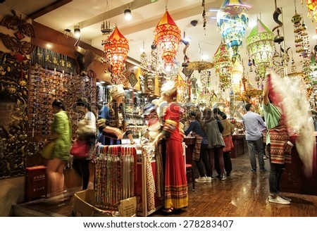 SHANGHAI, CHINA - MAY 2, 2015: Interior of a store with Chinese items at the famous Nanjing Road. It is the main shopping street of Shanghai, China, and is one of the world\'s busiest shopping streets.