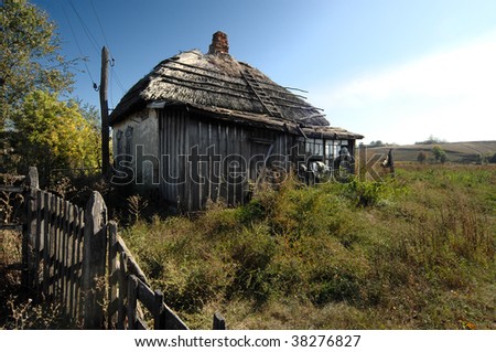 Deserted house with thatched roof in the village