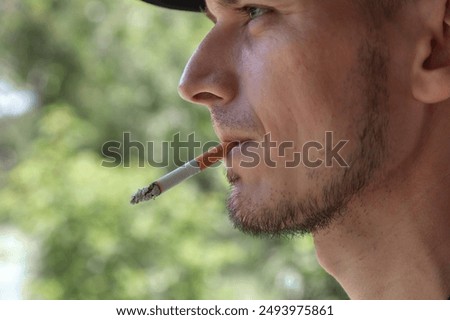 Similar – Image, Stock Photo Black man smoking in studio with neon illumination