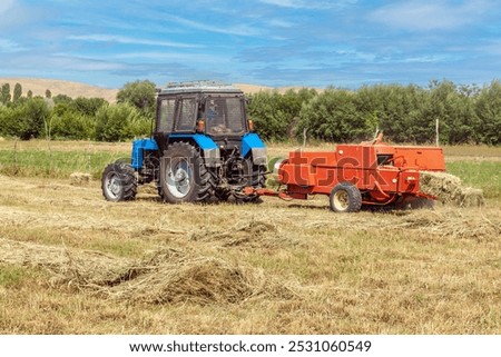 Similar – Image, Stock Photo Swaths of straw and conspicuous ruts on a mown field on a slope, in front of six different small deciduous trees, a road and a meadow / Summer