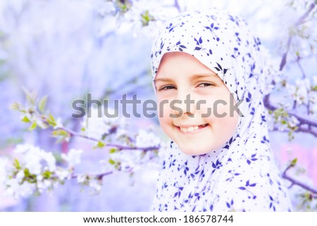 Little muslim girl outdoor - Spring time