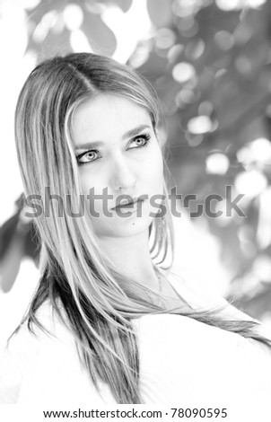 Portrait of an young beautiful  girl in the nature - black and white