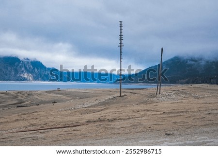 Similar – Image, Stock Photo deserted sandy beach with surveillance tower