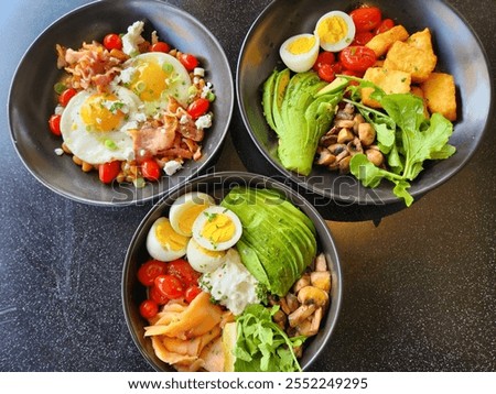 Similar – Image, Stock Photo Healthy breakfast. Bowl with cereals, raspberries and blueberries next to oranges