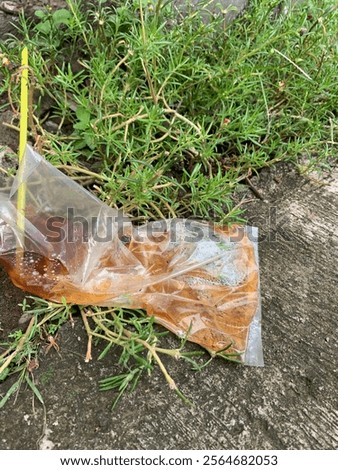 Similar – Image, Stock Photo Plastic straws thrown in ocean. Pollution concept. Flat lay on pink background