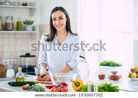 Similar – Image, Stock Photo Happy young brunette female exercising and stretching in the park