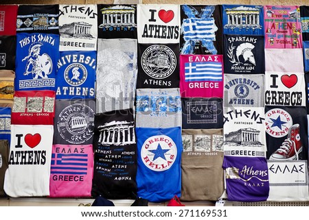 Athens, Greece - April 19, 2015 Tshirts souvenir shop in the capital of Greece at Athens Plaka - T-shirts merchandising with common ads logos from worldwide companies and local places