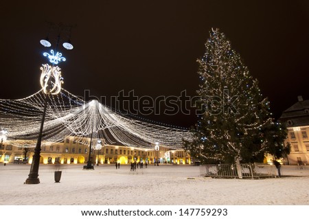 Christmas tree and lights in old town square in Sibiu Transylvania Romania
