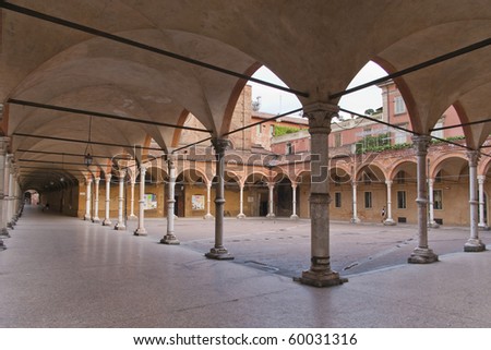 town square and street in Bologna with arches (portici) surrounding the public space