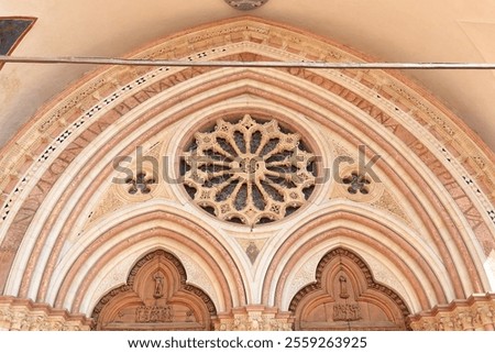 Similar – Image, Stock Photo Rose window and sculpted filigrees at the front of a gothic cathedral