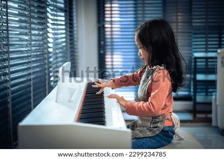 Similar – Image, Stock Photo Crop woman playing piano at home